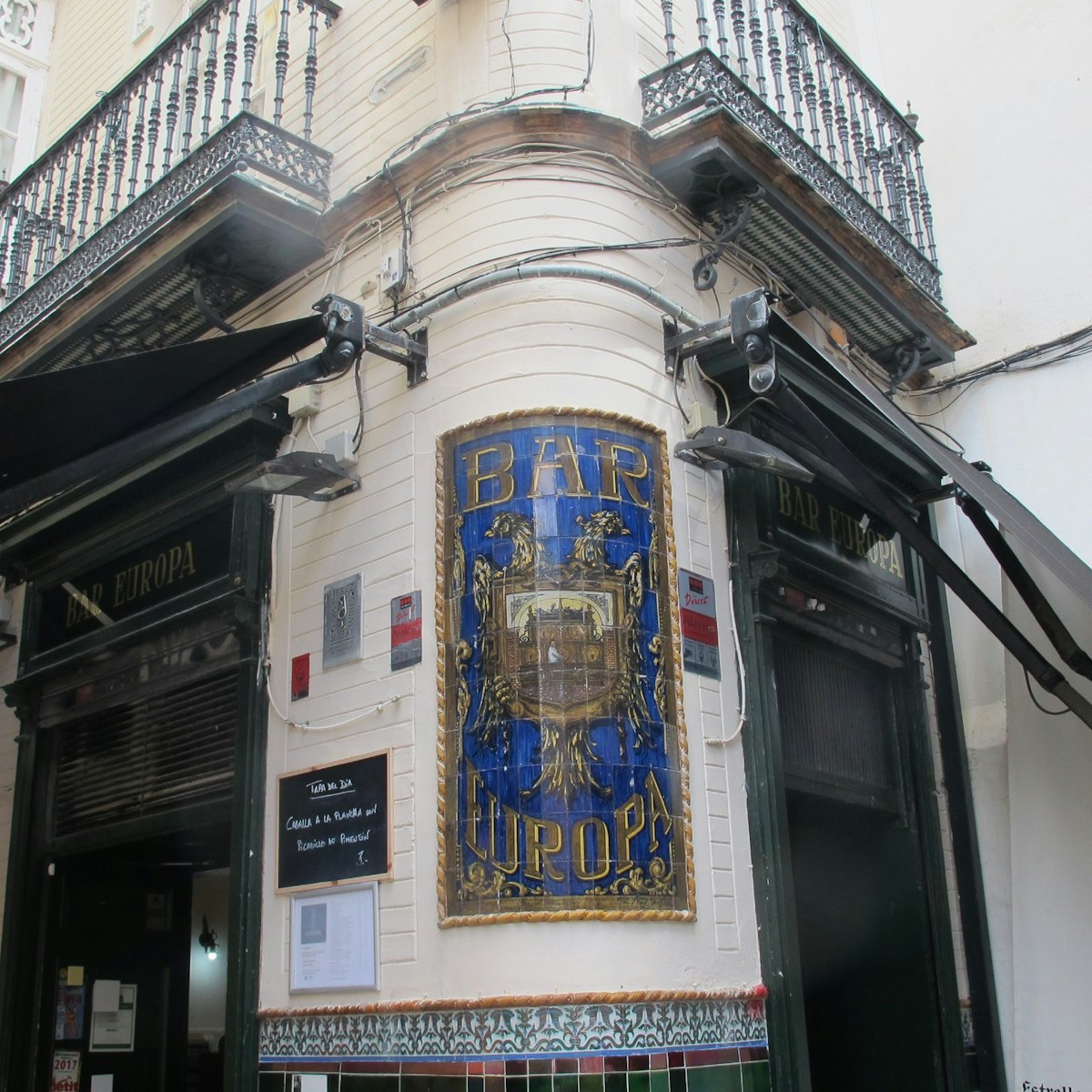Exterior of bar with tiled panel, Bar Europa.
