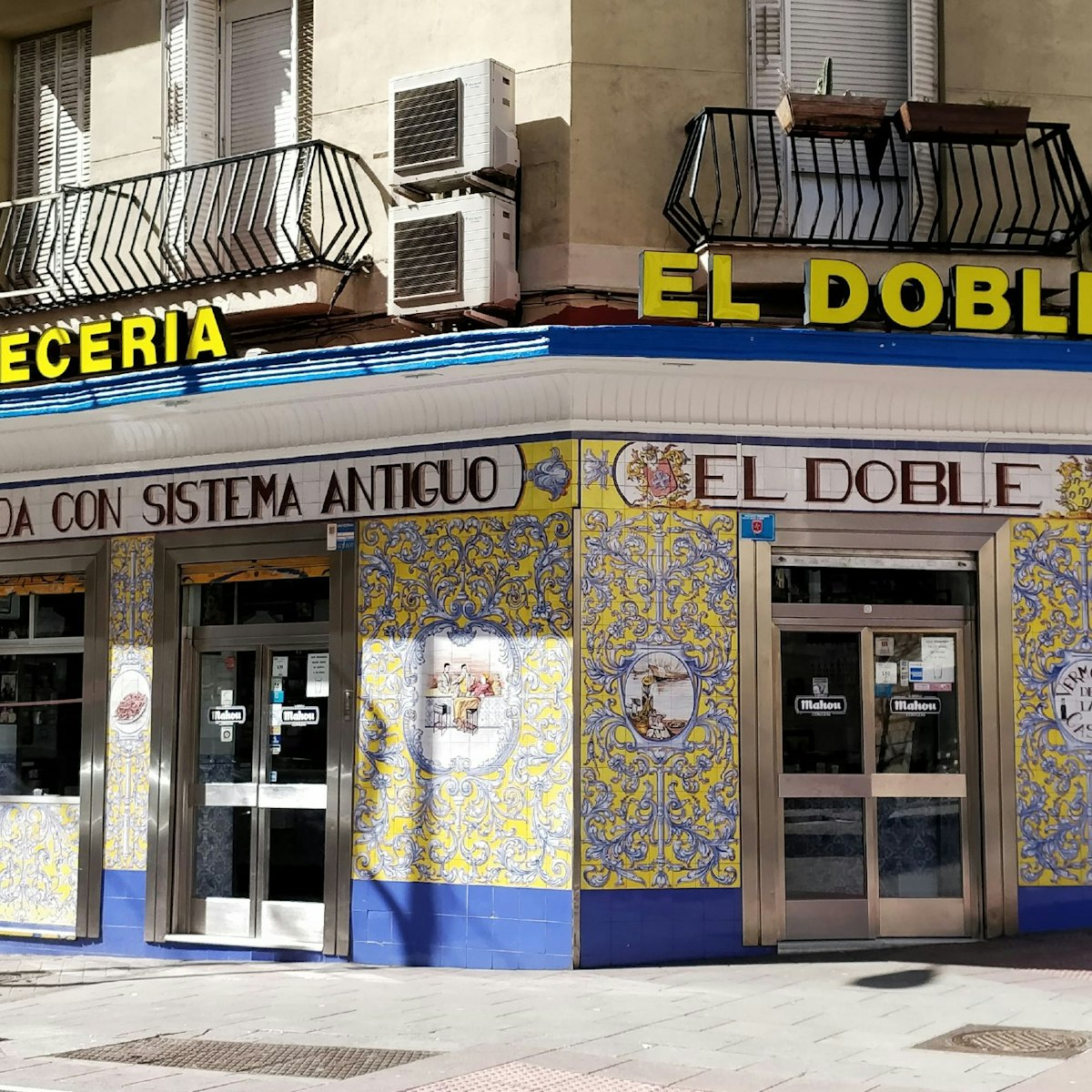 The tiled facade at Cervecería El Doble.