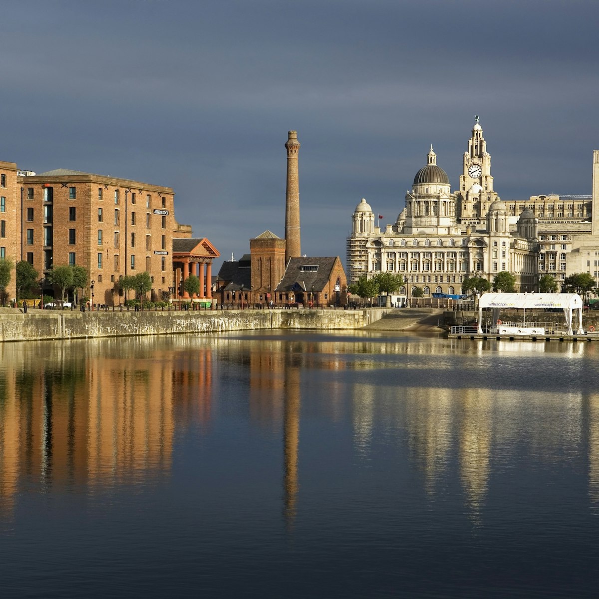 Salthouse Dock  To the right the three graces of Pier Head the Royal Liver Building, The Cunard Building and the Port of Liverpool Building  To the left Albert Dock Buildings Liverpool  England  UK