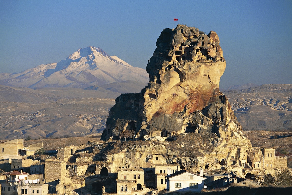 Ortahisar fortress with Mount Erciyes in the background, Cappadocia, Turkey