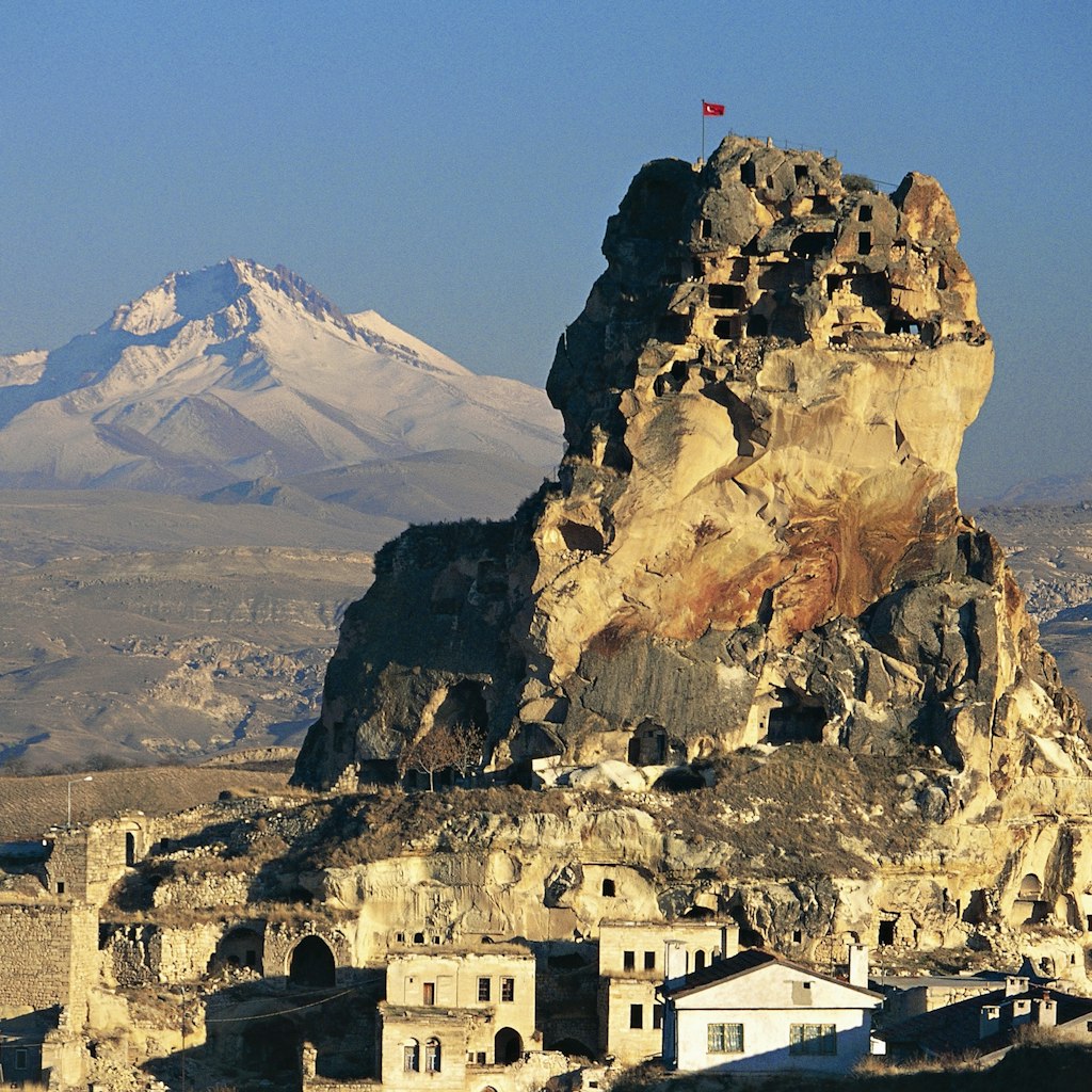 Ortahisar fortress with Mount Erciyes in the background, Cappadocia, Turkey