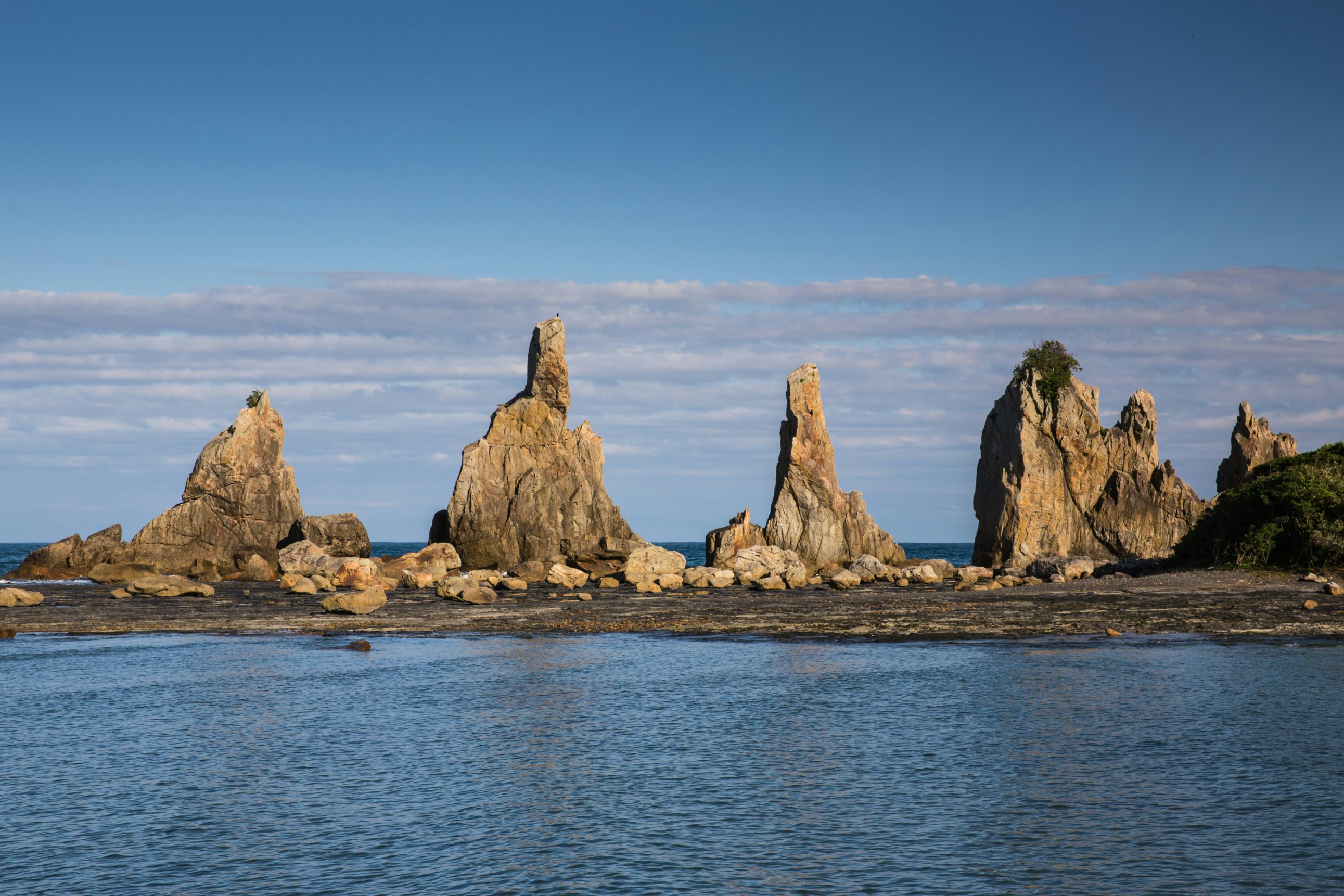 A natural formation of Hashigui Iwa rock, Kushimoto town, Wakayama, Japan; Shutterstock ID 635896211; Your name (First / Last): Laura Crawford; GL account no.: 65050; Netsuite department name: Online Editorial; Full Product or Project name including edition: Kii Peninsula page online images for BiT