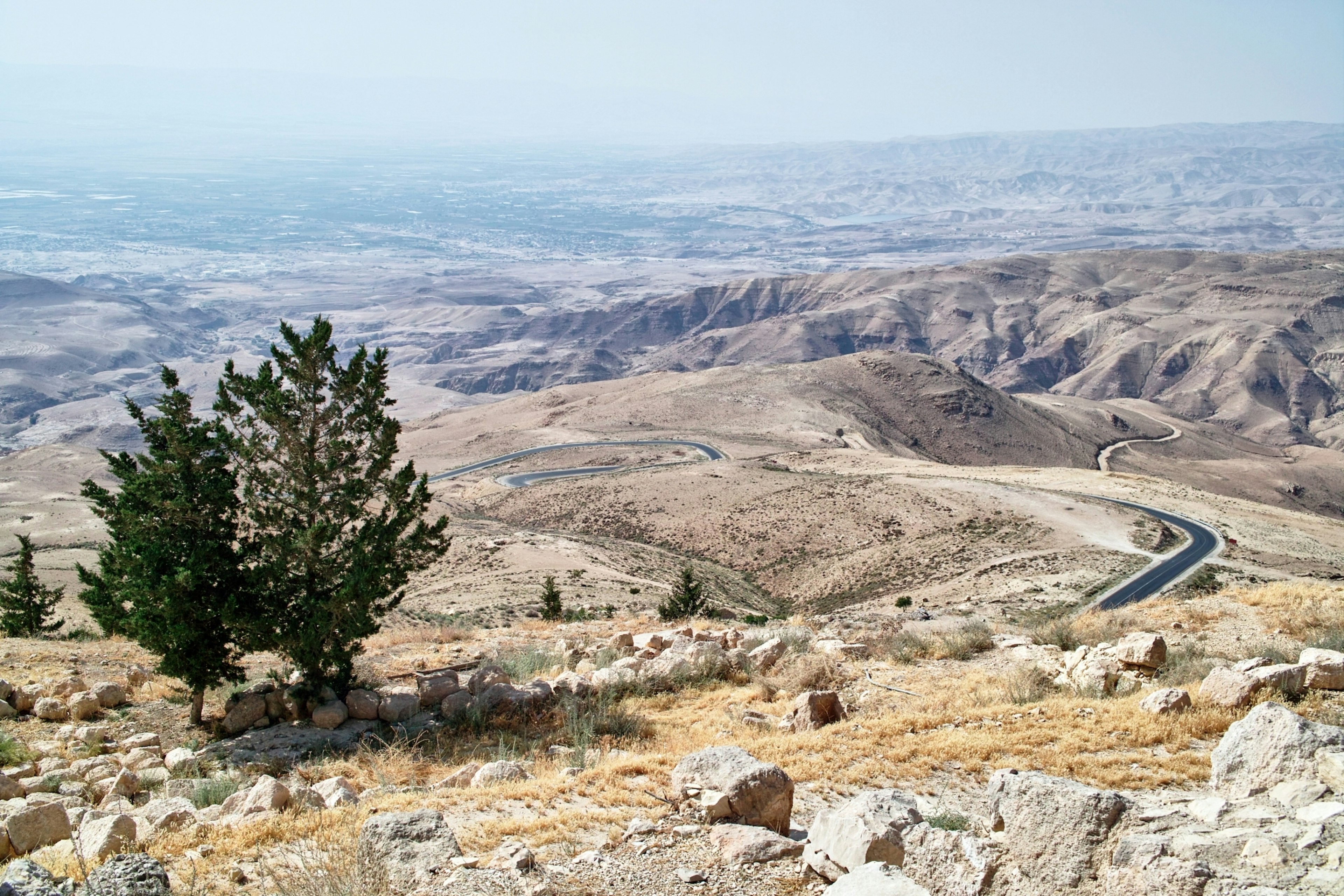 View of from Mt Nebo, Madaba, Jordan, with undulating mountains stretching out into the distance.