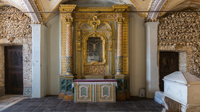 EVORA PORTUGAL- October 20, 2015:The Capela dos Ossos (Chapel of Bones), Church of St. Francis.The Chapel gets its name because the interior walls are covered and decorated with human skulls and bones; Shutterstock ID 530589013; Your name (First / Last): Tom Stainer; GL account no.: 65050 ; Netsuite department name: Online Editorial ; Full Product or Project name including edition: Best in Europe 2017