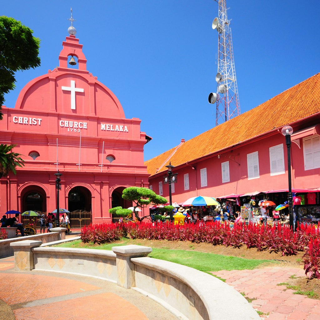 MALACCA, MALAYSIA - MAY 19: A view of Christ Church & Dutch Square on May 19, 2012 in Malacca, Malaysia. It was built in 1753 by Dutch & is the oldest 18th century Protestant church in Malaysia.; Shutterstock ID 111271517; Your name (First / Last): Lauren Gillmroe; GL account no.: 56530; Netsuite department name: Online-Design; Full Product or Project name including edition: 65050/ Online Design /LaurenGillmore/POI