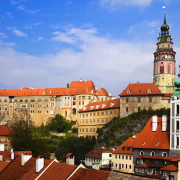 View of Cesky Krumlov Castle seen across town's rooftops, Cesky Krumlov, Czech Republic