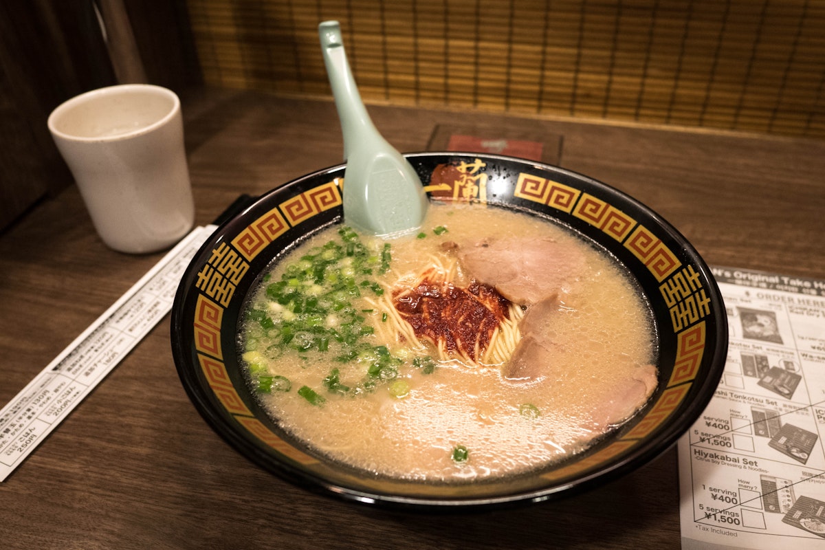Fukuoka, Japan - Jan 20, 2017 : Ichiran Ramen chain in Fukuoka at Hakata railway station. Ichiran Tonkotsu Ramen is found in Fukuoka Prefecture in 1960.; Shutterstock ID 584799376; Your name (First / Last): Laura Crawford; GL account no.: 65050; Netsuite department name: Online Editorial; Full Product or Project name including edition: POI images for lp.com