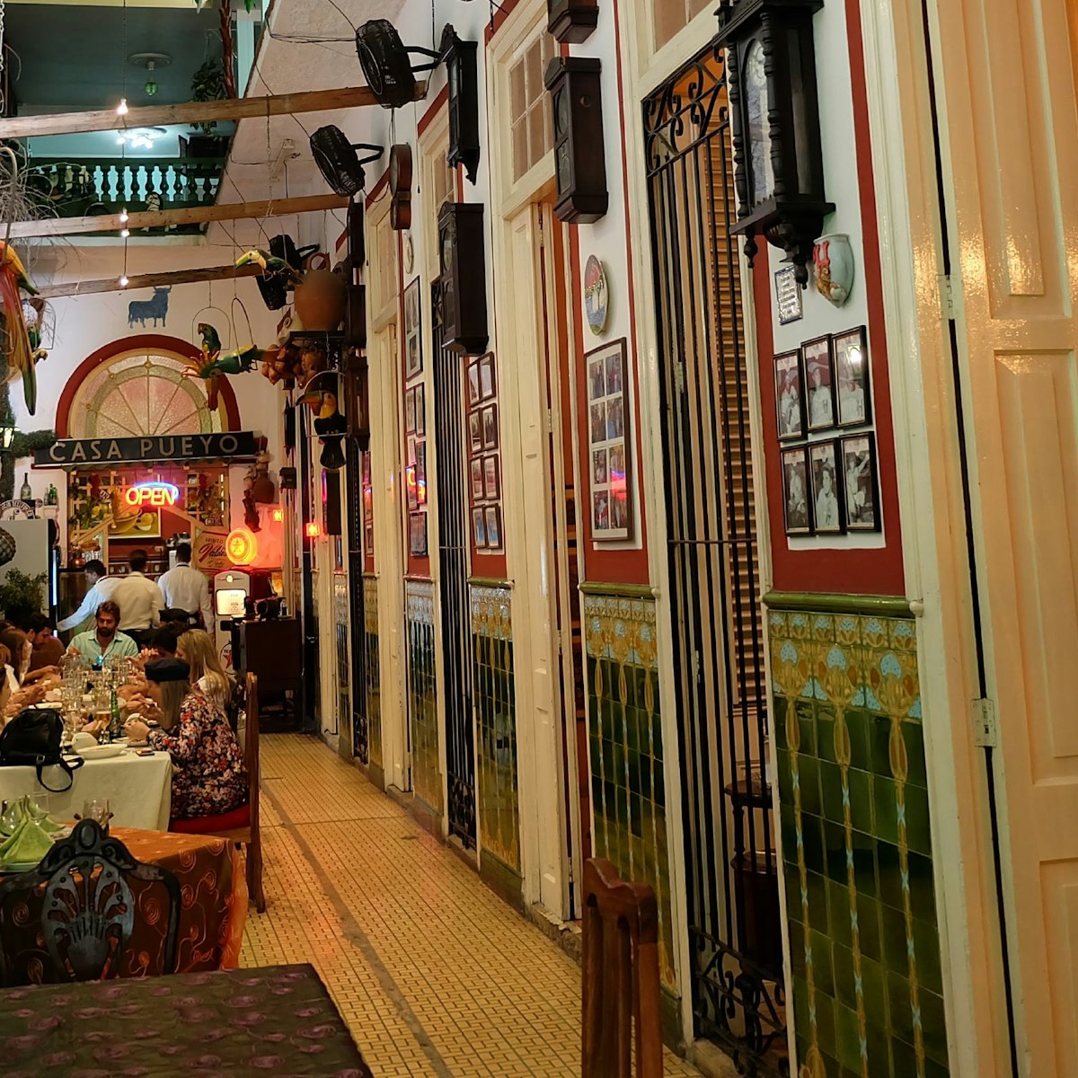 Restaurante San Cristóbal’s interior decoration is fully loaded with old photos, posters, signs, artifacts and animal skins.