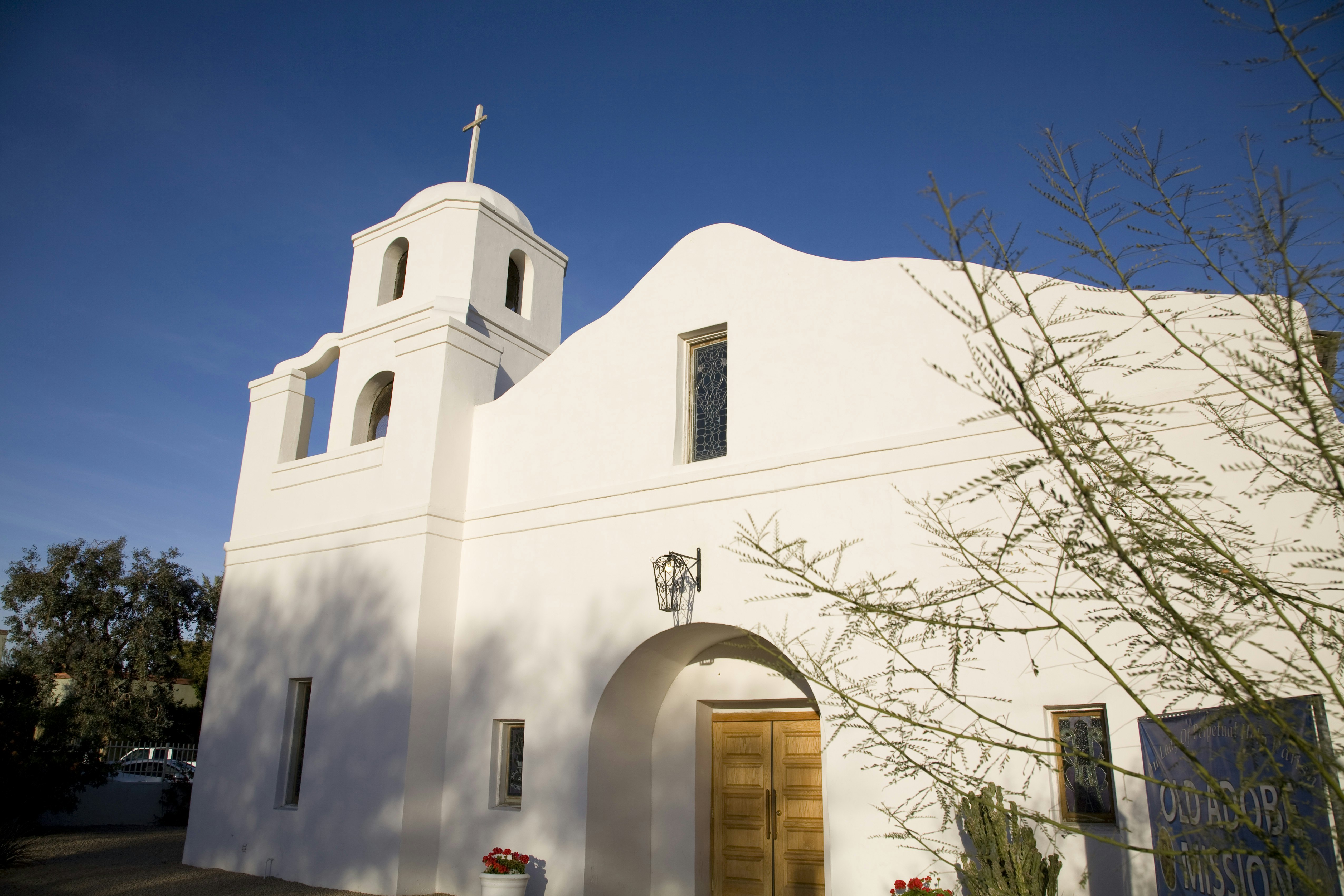 Old Adobe Mission with cross at top