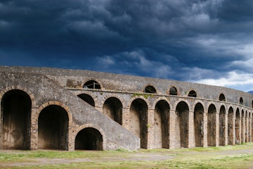 Storm Clouds gather over Colosseum in Pompeii Italy.