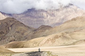 Motorcyclist on the Pamir Highway, Tajikistan