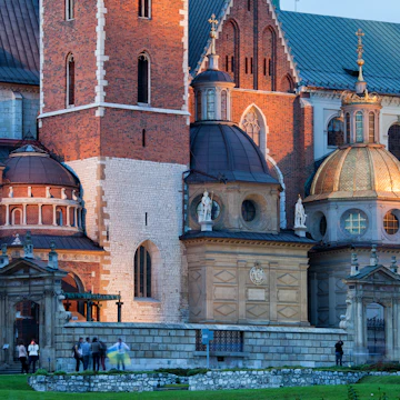 The Wawel Royal Cathedral (Polish: Katedra Wawelska, na Wawelu) by night in Krakow, Poland, city landmark dating back to the 11th century.