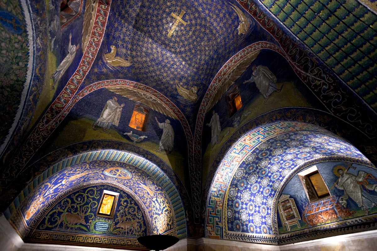 dark blue Ceiling Mosaic of the galla placidia mausoleum. Built between 425 and 433, this small mausoleum adopts a cruciform plan, in Ravenna, Italy on November 4, 2012