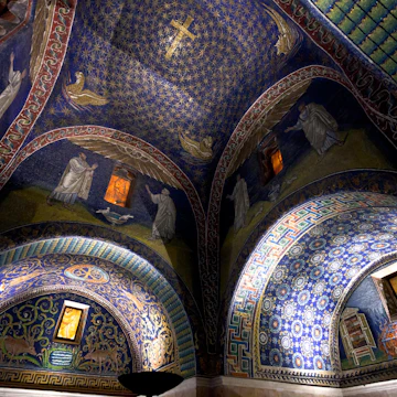 dark blue Ceiling Mosaic of the galla placidia mausoleum. Built between 425 and 433, this small mausoleum adopts a cruciform plan, in Ravenna, Italy on November 4, 2012