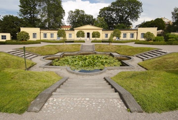 The Linnaeus Garden, Aquarium lacustre with orangery behind, Hammarby, Sweden