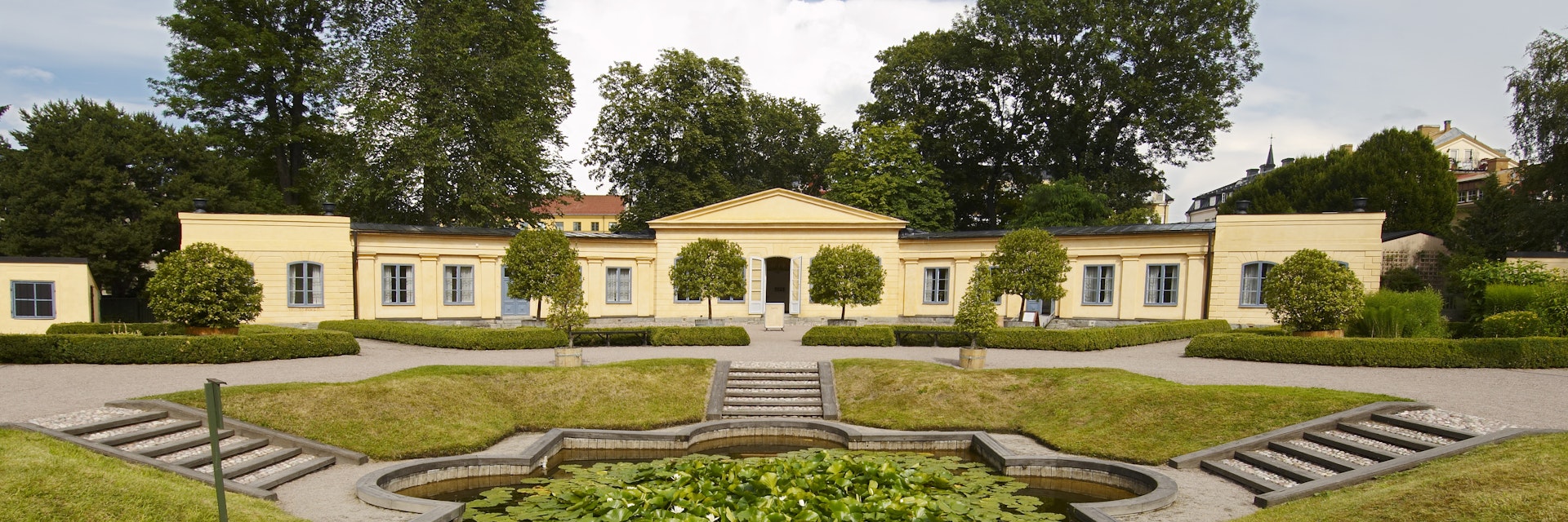 The Linnaeus Garden, Aquarium lacustre with orangery behind, Hammarby, Sweden