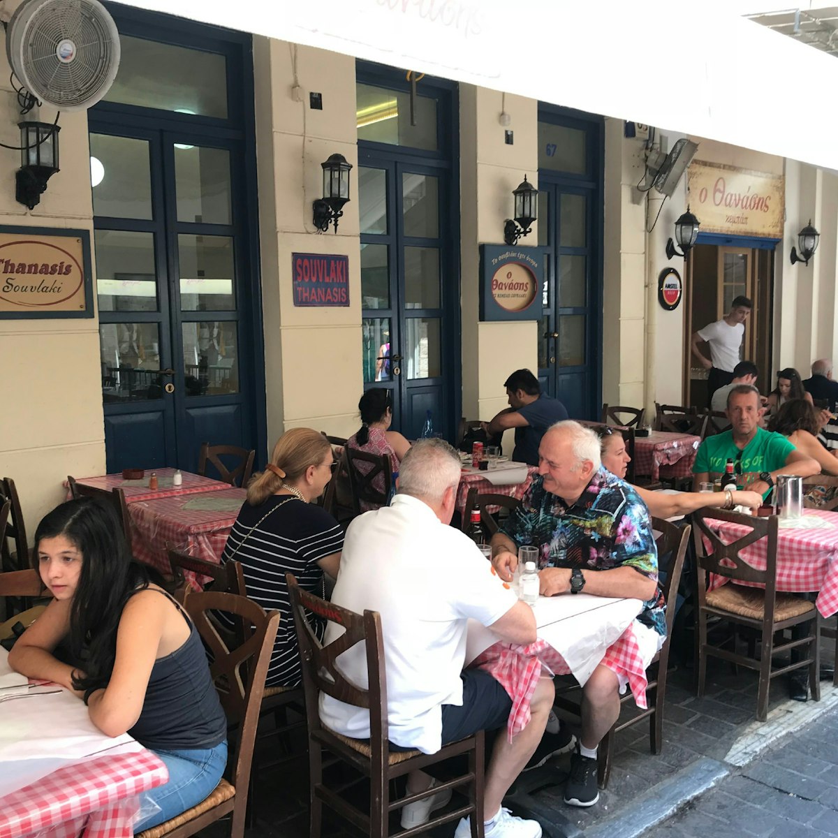 Outdoor tables at Thanasis restaurant in Athens.