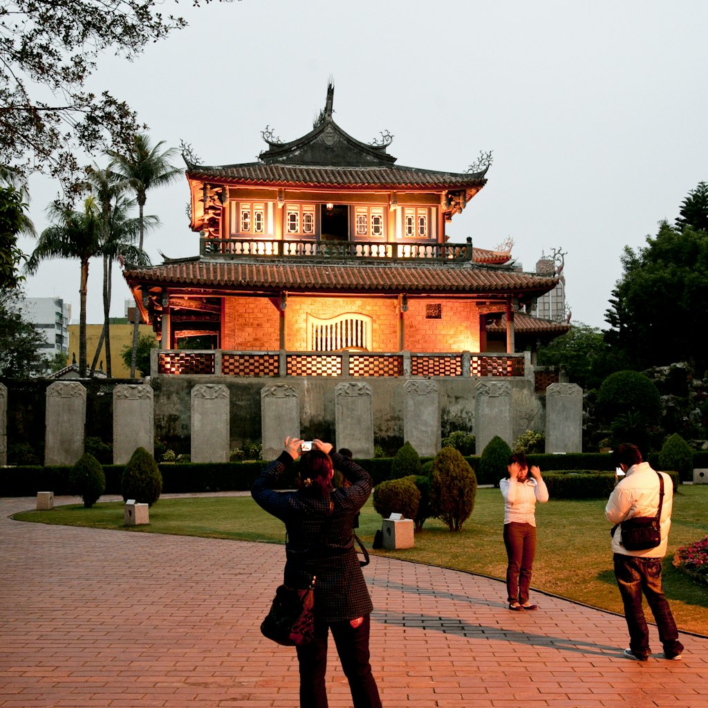 Tourists in front of Chihkan Towers in the evening, Fort Proventia, Tainan, Republic of China, Taiwan, Asia