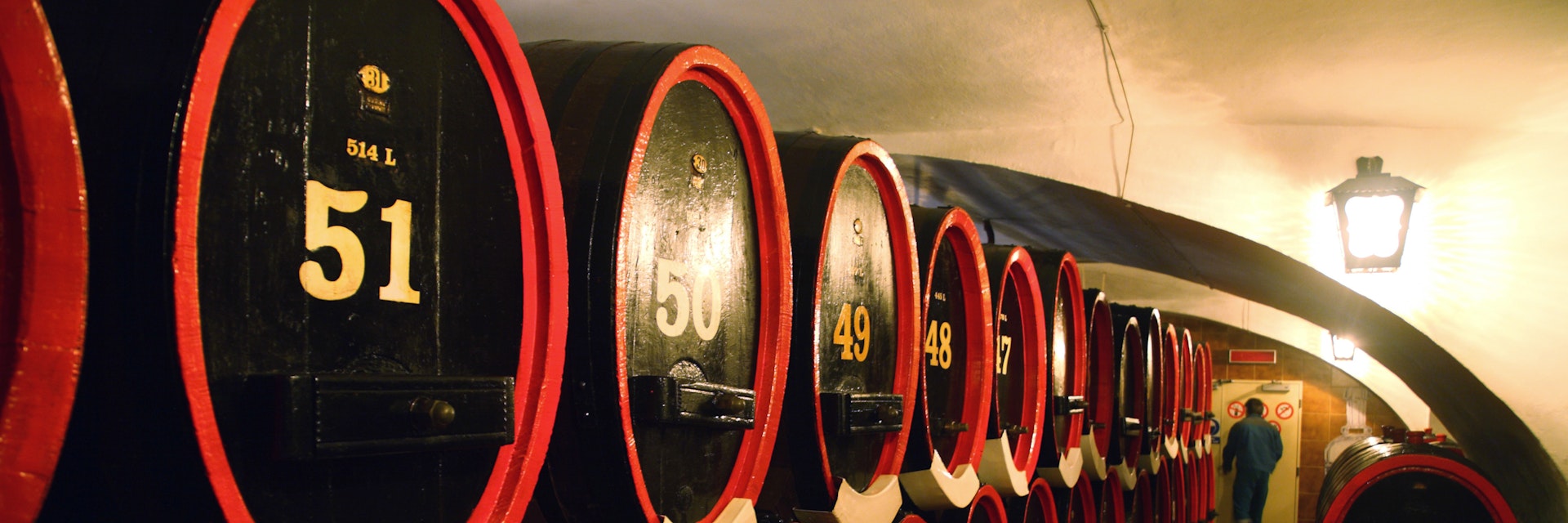 Barrels contain Becherovka bitters in cellar of Becherovka Museum, Karlovy Vary, Czech Republic