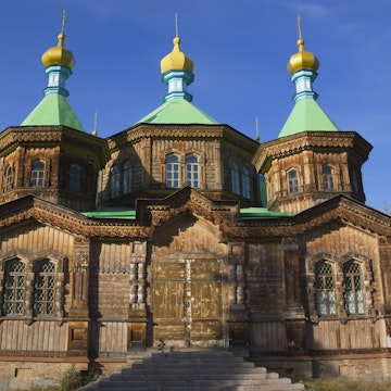 Wooden Holy Trinity Church with onion domes.