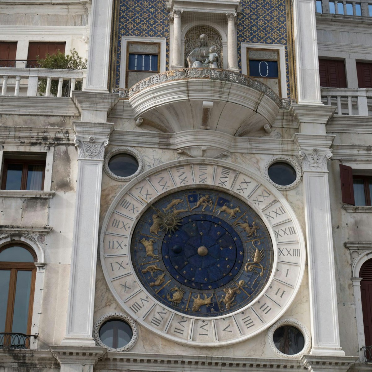 Torre dell'Orologio, the clock face shows both the hours and signs of the zodiac