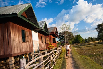 A bike ride alongside local houses