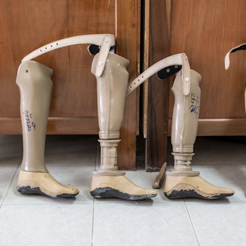 VIENTIANE, LAOS - NOVEMBER 05: A collection of artificial lower legs at COPE, the documentation and rehabilitation centre for the victims of landmines and cluster munitions, on November 05, 2012 in Vientiane, Laos. (Photo by Thomas Imo/Photothek via Getty Images)