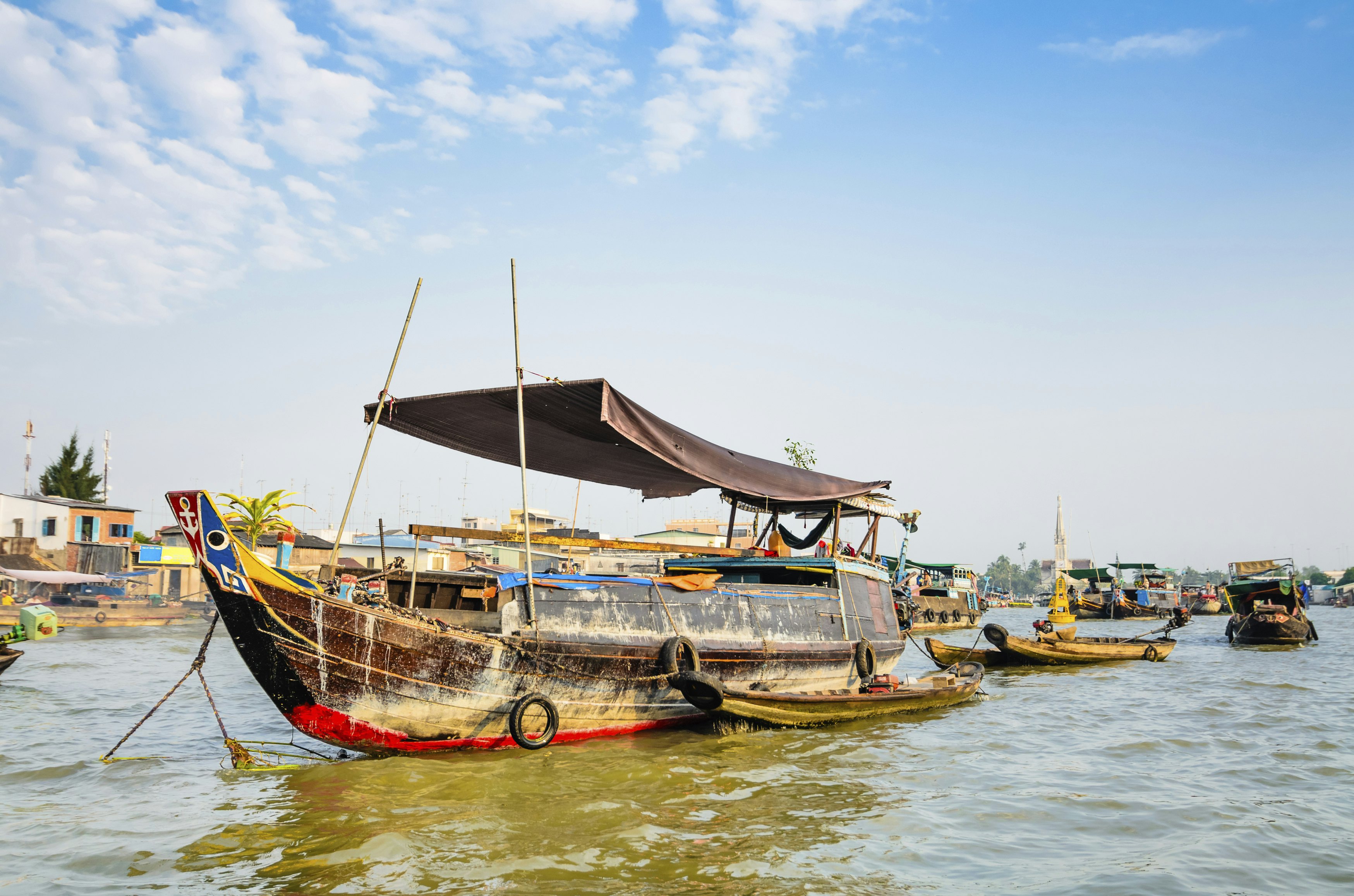 Trading boats on Cai Be Floating Market, Mekong Delta