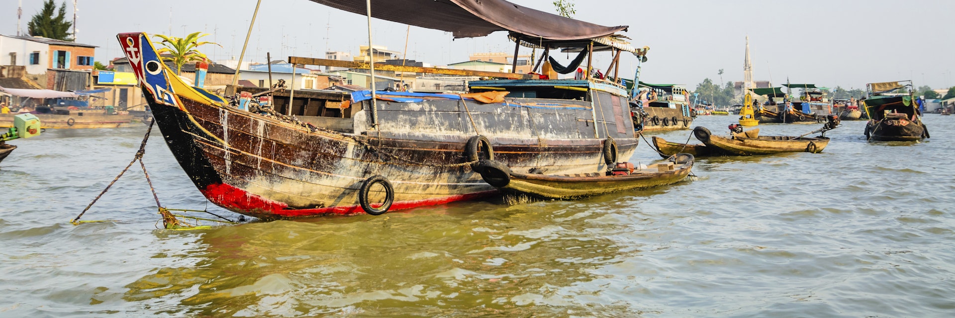 Trading boats on Cai Be Floating Market, Mekong Delta