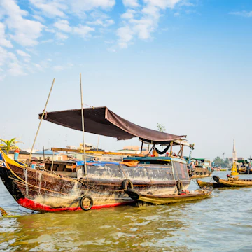 Trading boats on Cai Be Floating Market, Mekong Delta