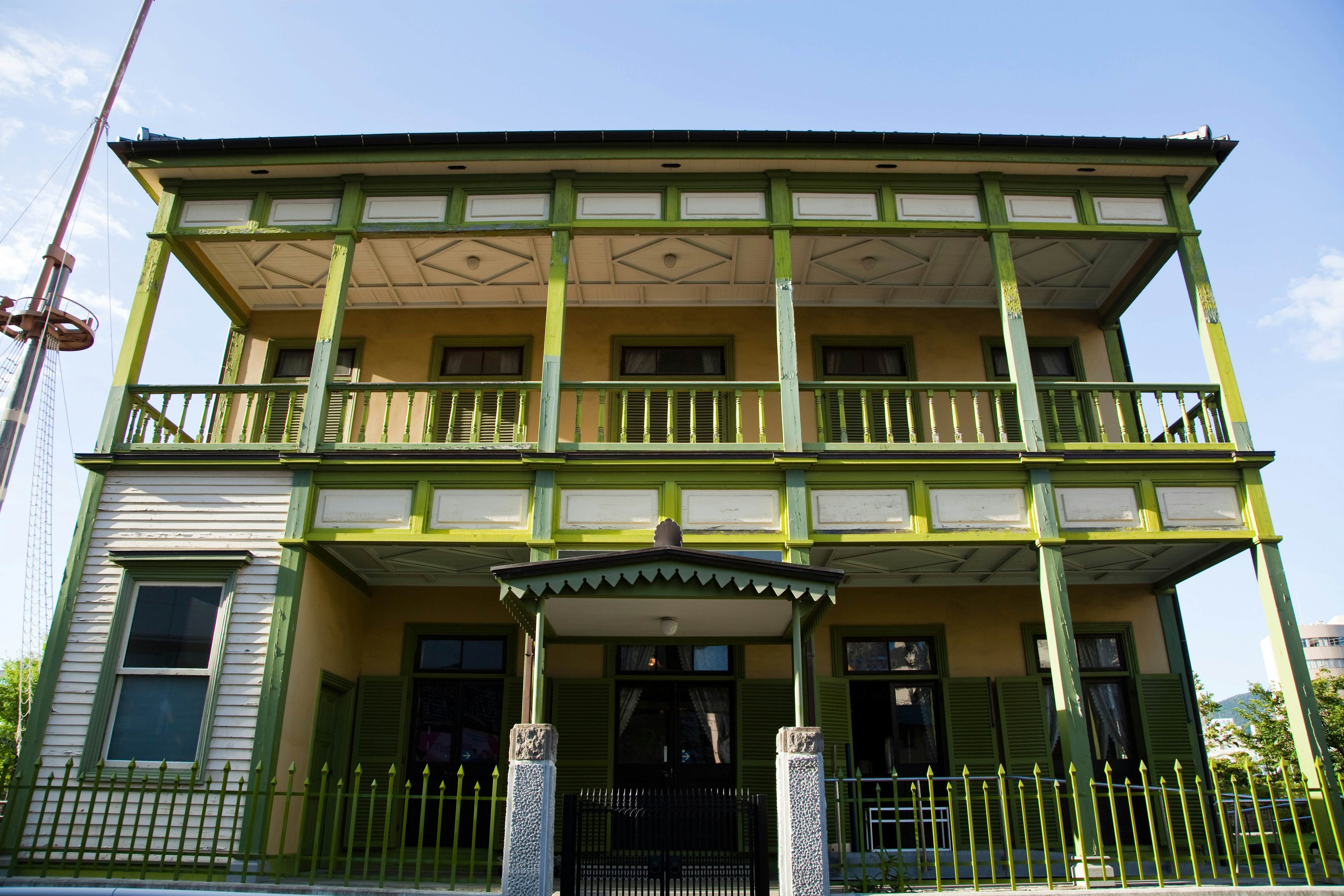 NAGASAKI, NAGASAKI-KEN, JAPAN - 2010/07/20: The former Nagasaki International club built in 1903. Dejima, literally "protruding island", was a small island in the bay of Nagasaki that was a Dutch trading post during Japan's self-imposed isolation of the Edo period from 1641 until 1853.  Here Dutch traders were stationed, keeping a small window on the outside world plus trade with the rest of the world..Since the closing of the Dutch East India Company's trading post in 1857, the island has been surrounded by reclaimed land and merged into Nagasaki. The island was designated a national historical site in 1922. Today, Dejima is a work in progress with the long-term plan to fully restore its characteristic fan-shaped form and all the embankment walls.. (Photo by John S Lander/LightRocket via Getty Images)