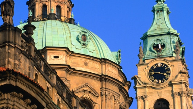 The towers of St Nicholas Church in Prague. Dienstenhofer, a German architect, built the church in an early 18th century Baroque style.
