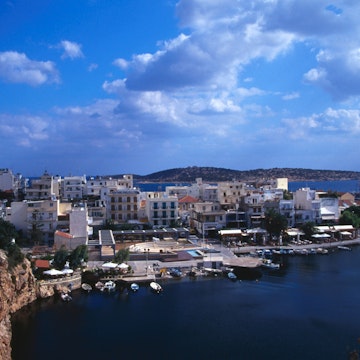 Wharf and buildings surrounding Voulismeni Lake.
