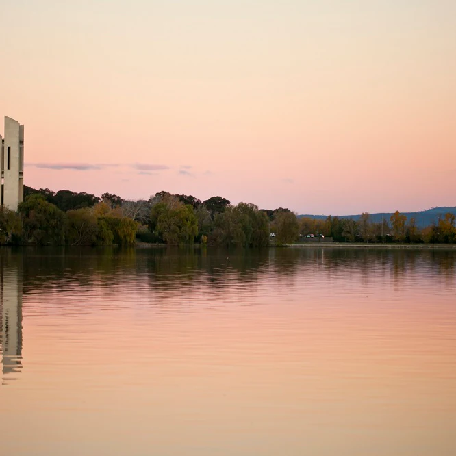 The National Carillon, situated on Aspen Island in Lake Burley Griffin, Canberra, Australian Capital Territory. The National Carillon has 55 bells housed in a 50m tall tower, and is in regular use. The height of the tower allows the music of the bells to drift across Lake Burley Griffin and through Kings and Commonwealth Parks. The best place to listen to the National Carillon is one where you have an unobstructed view of the tower and usually within a radius of one hundred metres though sound can usually be heard much further away.