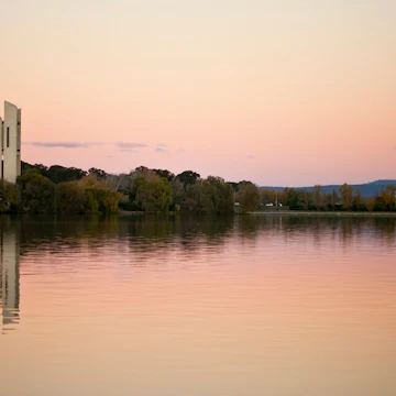 The National Carillon, situated on Aspen Island in Lake Burley Griffin, Canberra, Australian Capital Territory. The National Carillon has 55 bells housed in a 50m tall tower, and is in regular use. The height of the tower allows the music of the bells to drift across Lake Burley Griffin and through Kings and Commonwealth Parks. The best place to listen to the National Carillon is one where you have an unobstructed view of the tower and usually within a radius of one hundred metres though sound can usually be heard much further away.