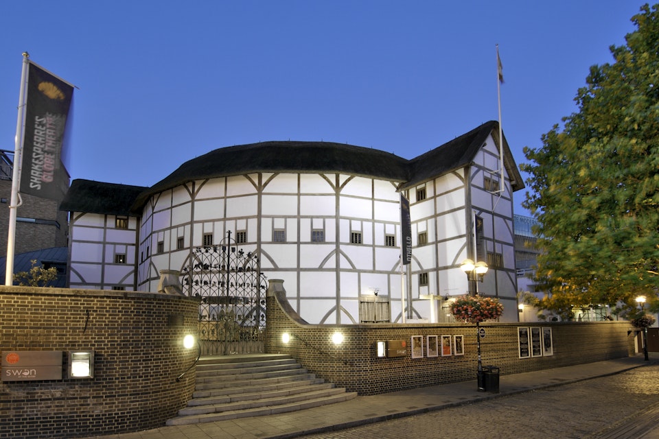 Dusk view of Shakespeare's Globe Theatre on the banks of the River Thames in London