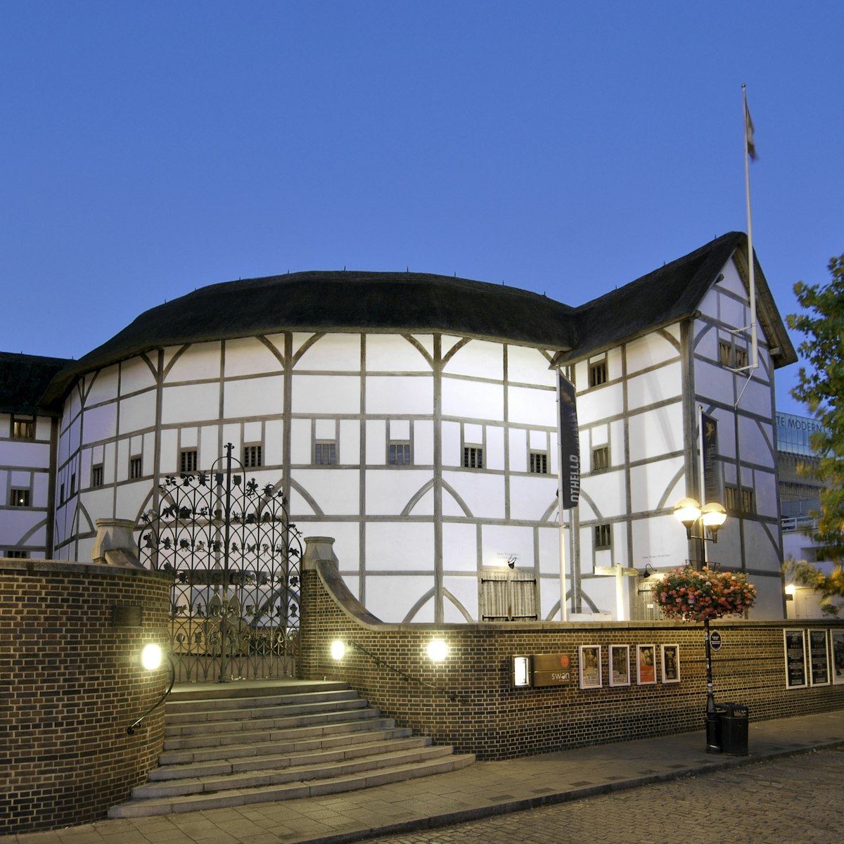 Dusk view of Shakespeare's Globe Theatre on the banks of the River Thames in London