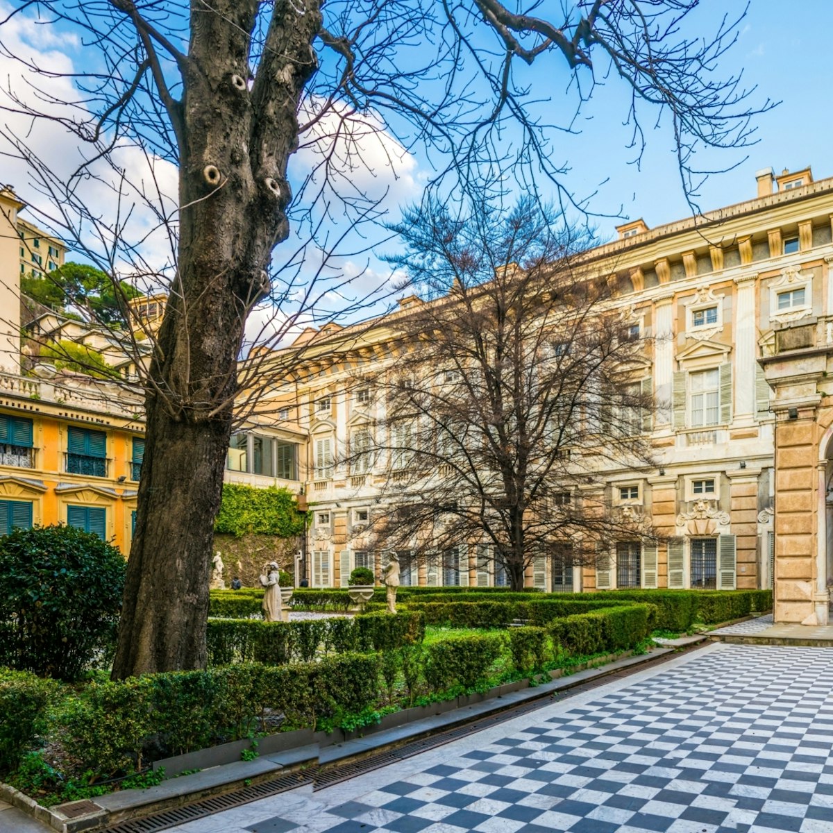 GENOA, ITALY, MARCH 13, 2016: View of a garden situated between palazzo bianco and palazzo doria tursi palace in Genoa, Italy; Shutterstock ID 483815368; Your name (First / Last): Anna Tyler; GL account no.: 65050; Netsuite department name: Online Editorial; Full Product or Project name including edition: destination-image-southern-europe