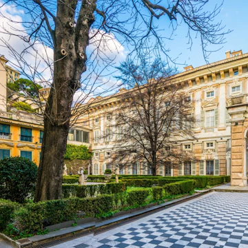 GENOA, ITALY, MARCH 13, 2016: View of a garden situated between palazzo bianco and palazzo doria tursi palace in Genoa, Italy; Shutterstock ID 483815368; Your name (First / Last): Anna Tyler; GL account no.: 65050; Netsuite department name: Online Editorial; Full Product or Project name including edition: destination-image-southern-europe
