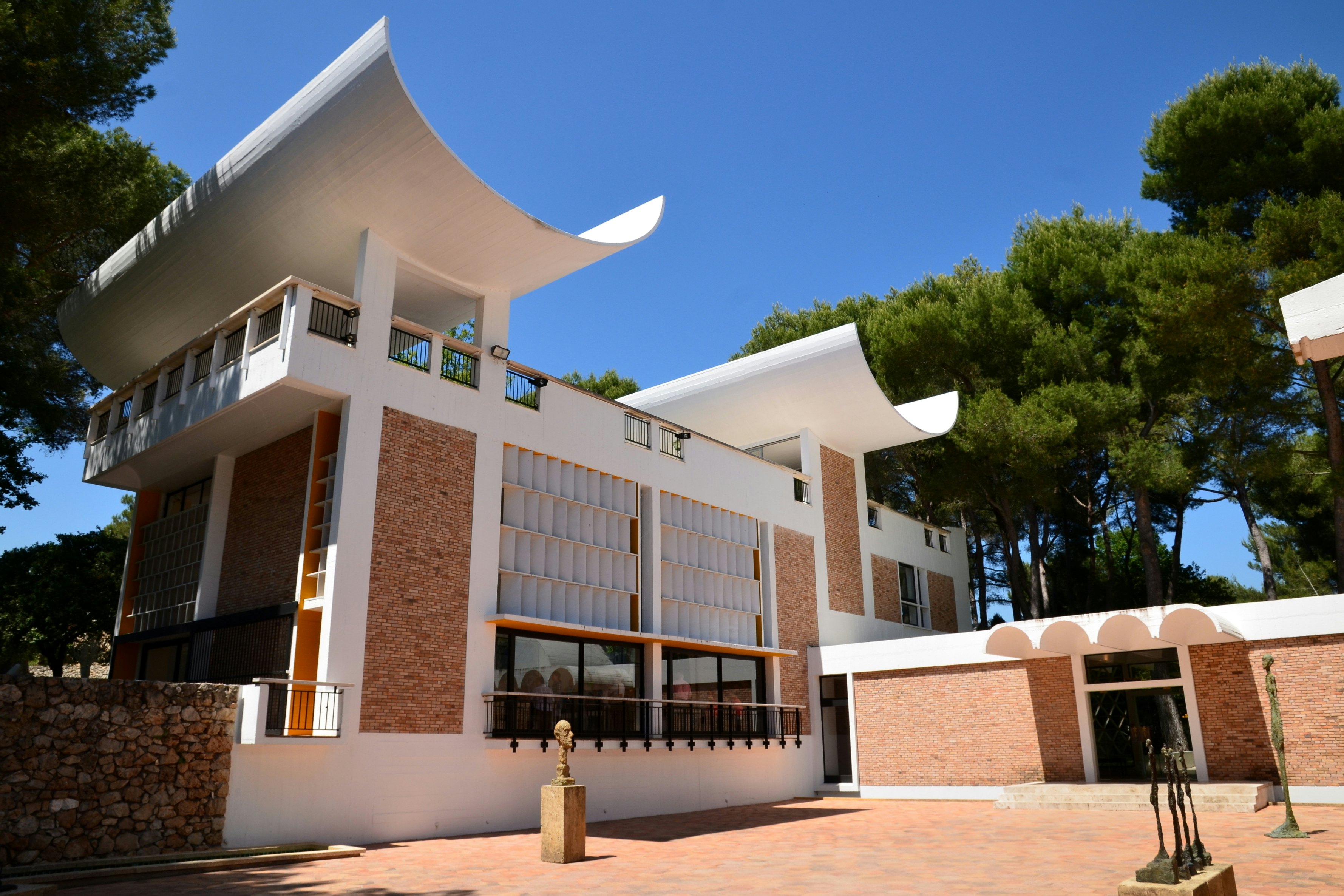 SAINT PAUL DE VENCE, FRANCE-JUNE 13: Foundation Maeght facade shown un june 13, 2013 in Saint Paul de Vence, France. This famous foundation is conceived to represent the modern and contemporary art.; Shutterstock ID 142365454