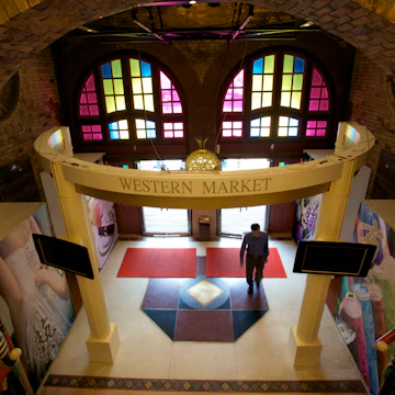 Man walking through entrance of Western Market in Sheung Wan.