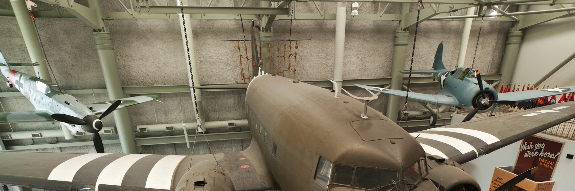 Douglas C-47 Dakota, transport glidertowning aircraft in D-Day markings at the National WWII Museum.