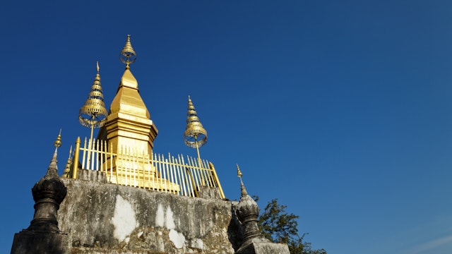 That Chomsi stupa at top of Phu Si hill.