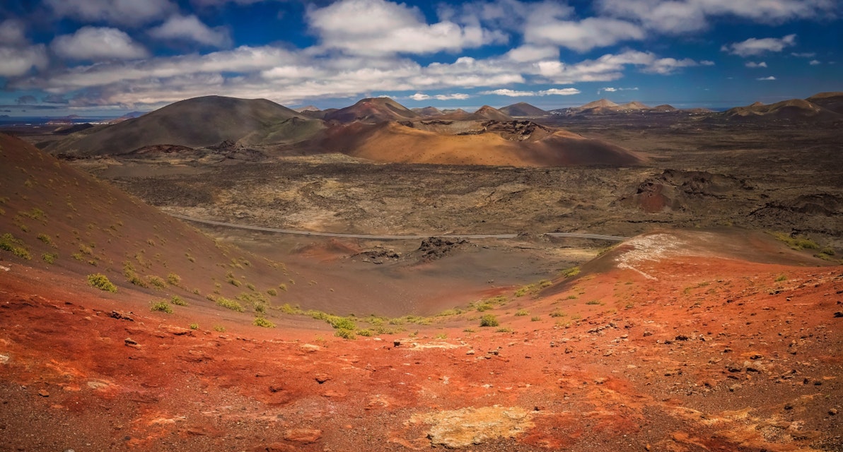 Panoramic view of the Timanfaya National Park ( also called The Montanas del Fuego or Mountains of Fire ) in Lanzarote, Canary Islands, Spain; Shutterstock ID 437700634; Your name (First / Last): Tom Stainer; GL account no.: 65050 ; Netsuite department name: Online Editorial; Full Product or Project name including edition: Best in Travel 2018