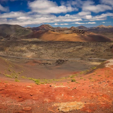 Panoramic view of the Timanfaya National Park ( also called The Montanas del Fuego or Mountains of Fire ) in Lanzarote, Canary Islands, Spain; Shutterstock ID 437700634; Your name (First / Last): Tom Stainer; GL account no.: 65050 ; Netsuite department name: Online Editorial; Full Product or Project name including edition: Best in Travel 2018