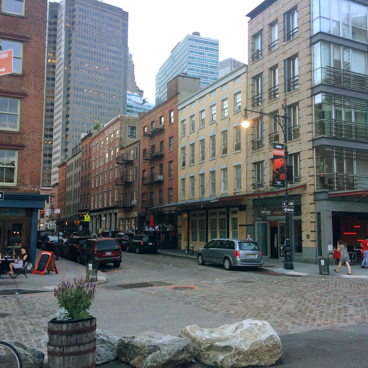 An intersection with businesses in the South Street Seaport