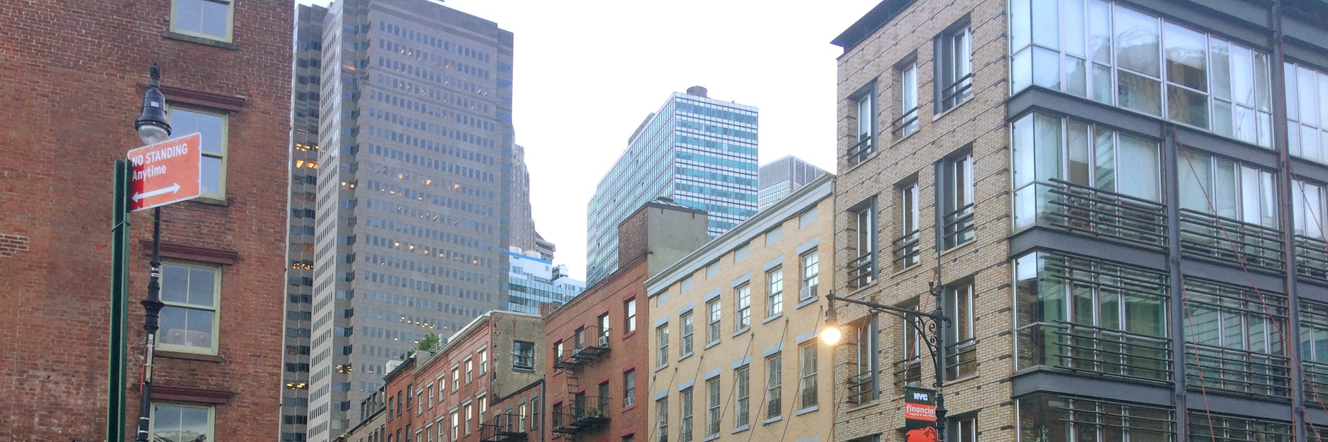An intersection with businesses in the South Street Seaport