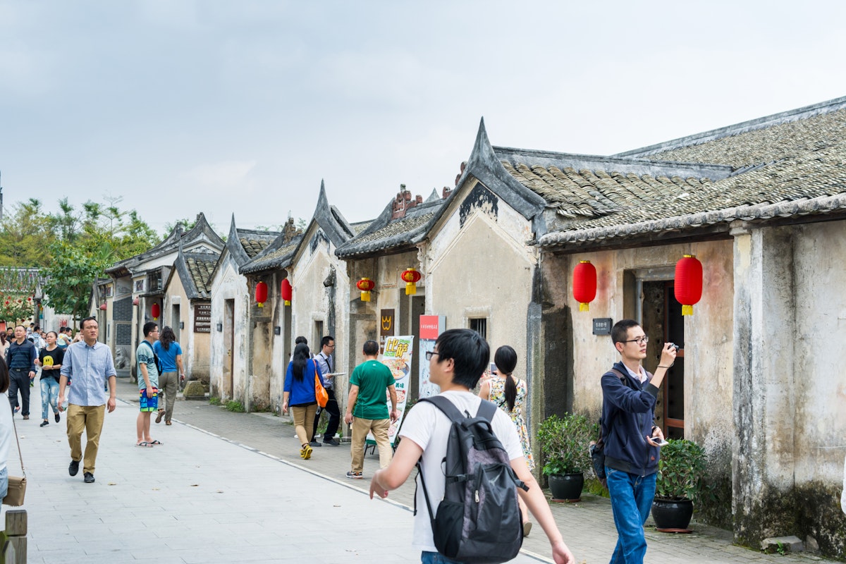 Shenzhen, China, April, 3rd, 2016, Editorial: Tourists visiting Guanlan Engraved Printing Painting Village, Shenzhen, China; Shutterstock ID 541482490; Your name (First / Last): Megan Eaves; GL account no.: 65050; Netsuite department name: Online Editorial; Full Product or Project name including edition: Destination image - North Asia