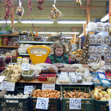 Fresh Produce Vendor At The Central Market Housed In Reconditioned Zeppelin Hangars, Riga, Latvia (Photo by: Insights/UIG via Getty Images)