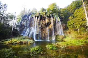 Water cascading into one of Plitvice’s upper lakes.